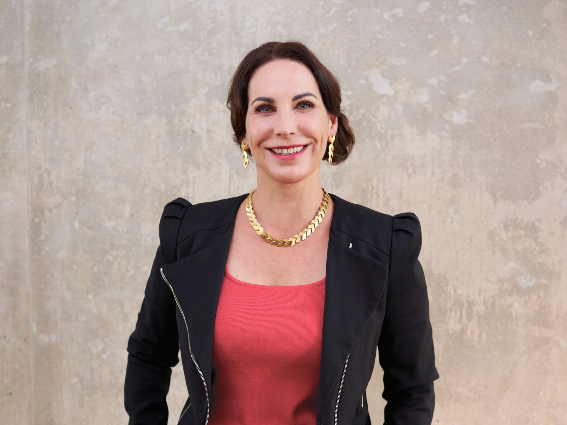 Katrin Winkler smiles. She has brown hair